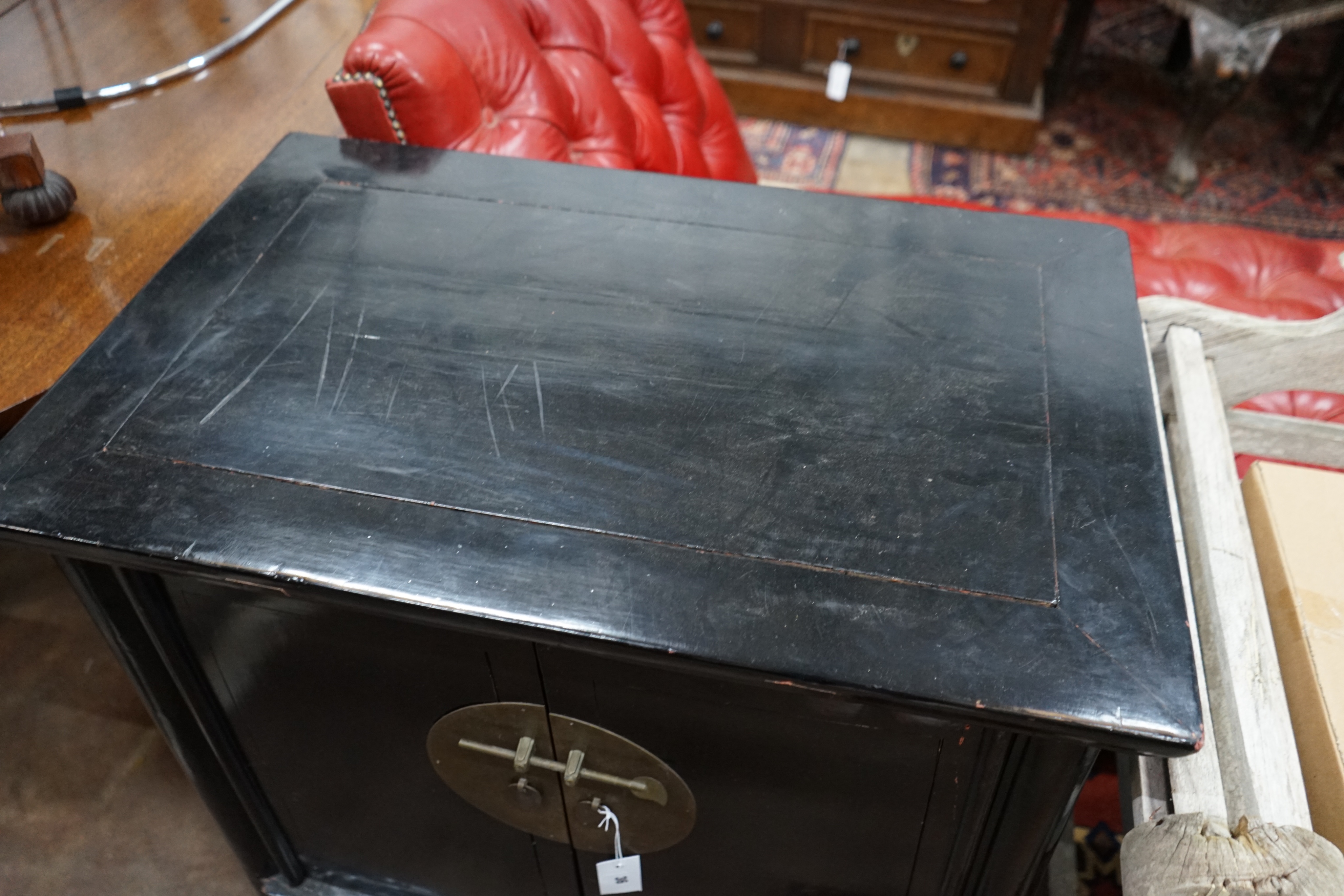 A Chinese lacquer two door side cabinet, width 78cm depth 50cm height 79cm